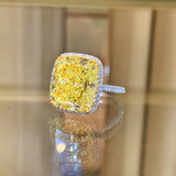 10.02ct HALO Cushion Cut Ring - Fancy Light Yellow SI1 GIA